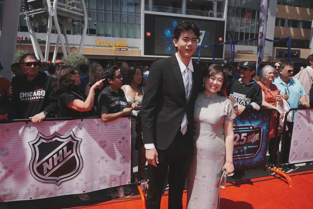 Simon Wang poses with his mother on the red carpet before the NHL draft in Los Angeles. Photo: AP