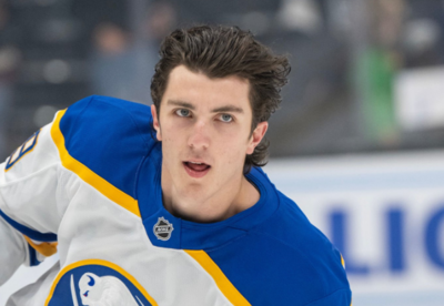 "Ouch," Peyton Krebs takes a hit on the face while sitting on the Sabres bench