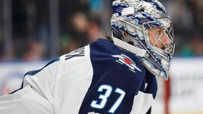 Connor Hellebuyck’s incredible season earns him both Hart and Vezina Trophies, rewriting NHL records