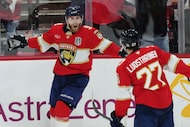 Florida Panthers' Sam Bennett (9) celebrates his goal against the Edmonton Oilers with Eetu...