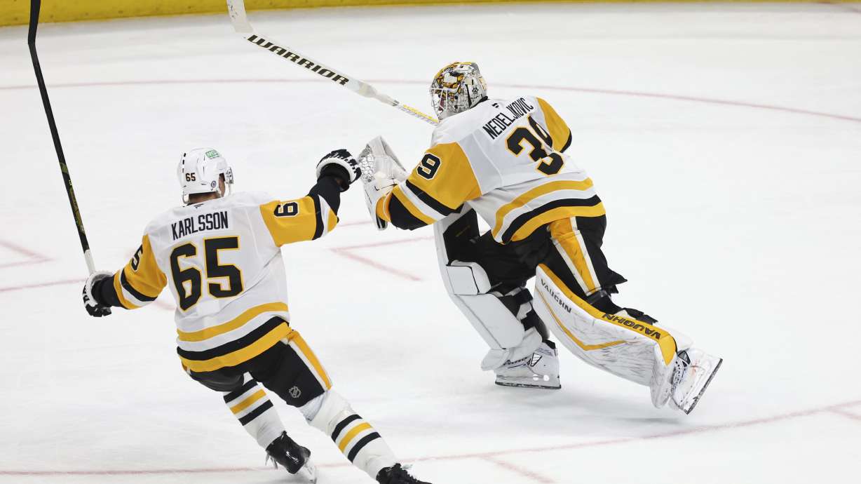 Nedeljkovic becomes 1st goalie with goal and assist, and has 40 saves as Penguins beat Sabres 5-2