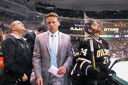 Dallas head coach Glen Gulutzan walks out of the bench area after the final horn sounds in...