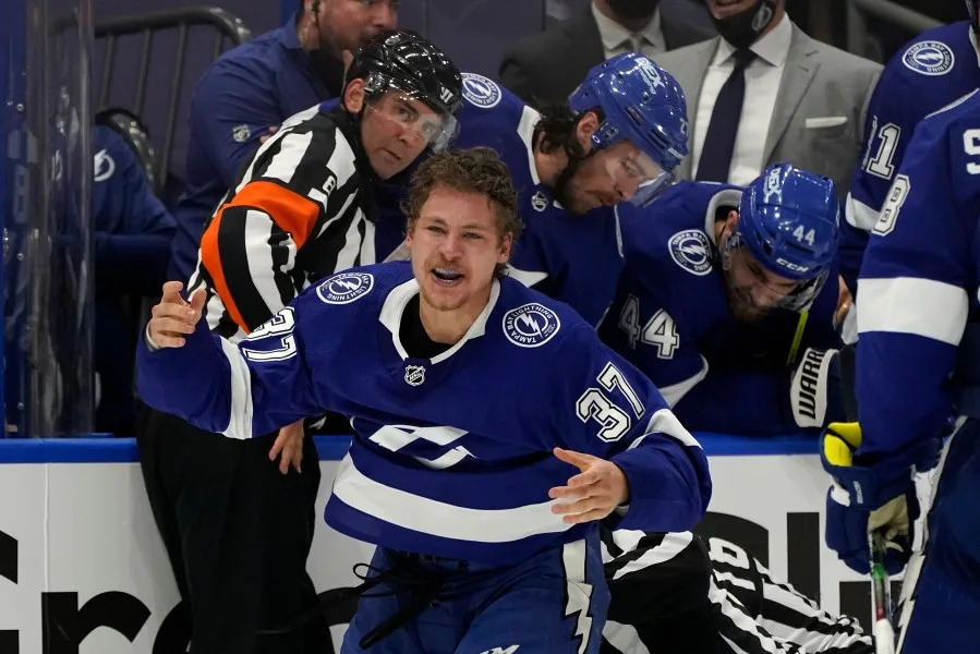 Tampa Bay Lightning center Yanni Gourde (37) reacts after getting into a fight with New York Islanders right wing Leo Komarov during the third period in Game 2 of an NHL hockey Stanley Cup semifinal playoff series Tuesday, June 15, 2021, in Tampa, Fla. (AP Photo/Chris O’Meara)