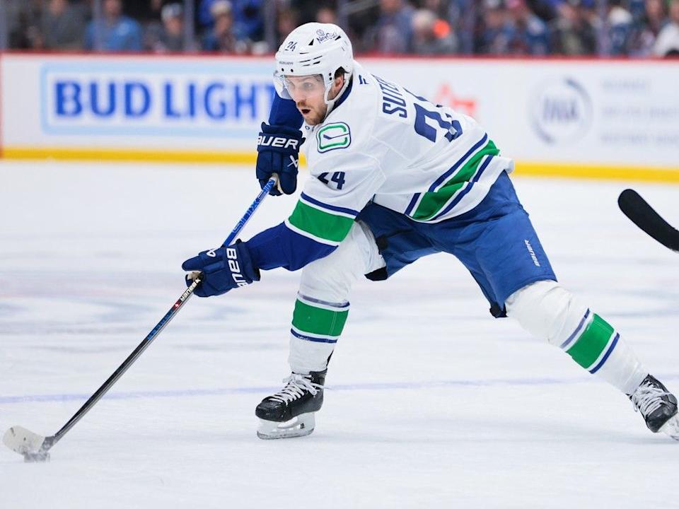  DENVER, COLORADO – APRIL 10: Pius Suter #24 of the Vancouver Canucks skates with the puck against the Colorado Avalanche during the first period at Ball Arena on April 10, 2025 in Denver, Colorado.