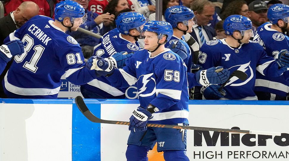 Tampa Bay Lightning center Jake Guentzel (59) celebrates with the bench after his goal against the Ottawa Senators during the first period of an NHL hockey game Thursday, Feb. 6, 2025, in Tampa, Fla. (AP Photo/Chris O'Meara)