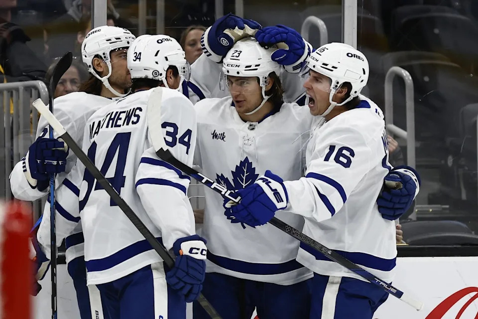 Toronto Maple Leafs left wing Matthew Knies (23) is congratulated by right wing Mitch Marner (16) and center Auston Matthews (34) after his goal against the Boston Bruins.Winslow Townson-Imagn Images