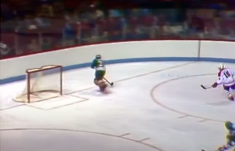John Garrett in action in 1980, earning the second assist on Gordie Howe's 801st and final NHL goal.
