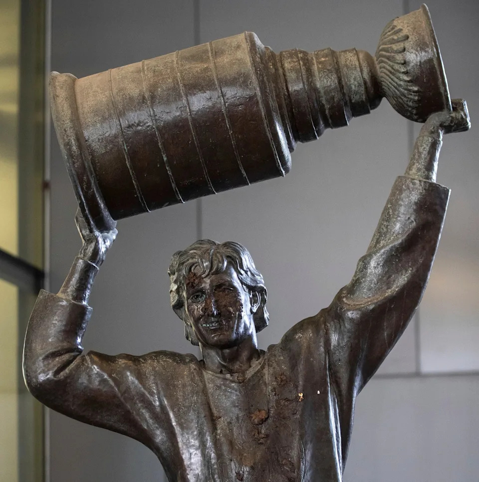 The Wayne Gretzky statue outside of Rogers Place, home of the NHL hockey team Edmonton Oilers, is covered with excrement after it was vandalised, in Edmonton, Alberta, Friday March 21, 2025