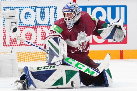 Vancouver Canucks goaltender Arturs Silovs suiting up for Latvia at the 2023 IIHF World Championship.