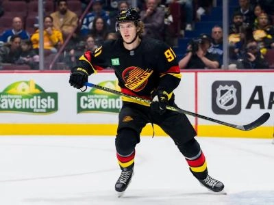 Vitali Kravtsov skates for the Vancouver Canucks during his brief stint with the team