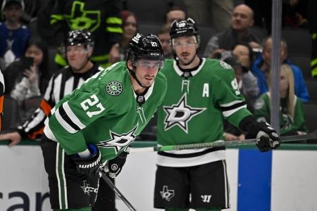 Dallas Stars forward Mason Marchment leaving the ice in pain after a collision against the Toronto Maple Leafs.