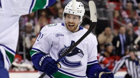 Pius Suter celebrates a goal for the Vancouver Canucks Pius Suter celebrates a goal for the Vancouver Canucks