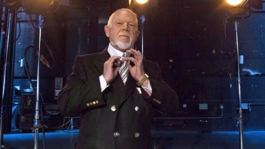 Don Cherry fixes his tie while still hosting the iconic intermission program, 