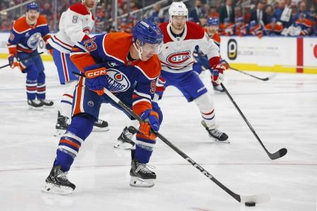 Mar 6, 2025; Edmonton, Alberta, CAN; Edmonton Oilers forward Ryan Nugent-Hopkins (93) looks to make a pass in front of Montreal Canadiens forward Joel Armia (40) during the first period at Rogers Place. Mandatory Credit: Perry Nelson-Imagn Images Mar 6, 2025; Edmonton, Alberta, CAN; Edmonton Oilers forward Ryan Nugent-Hopkins (93) looks to make a pass in front of Montreal Canadiens forward Joel Armia (40) during the first period at Rogers Place. Mandatory Credit: Perry Nelson-Imagn Images