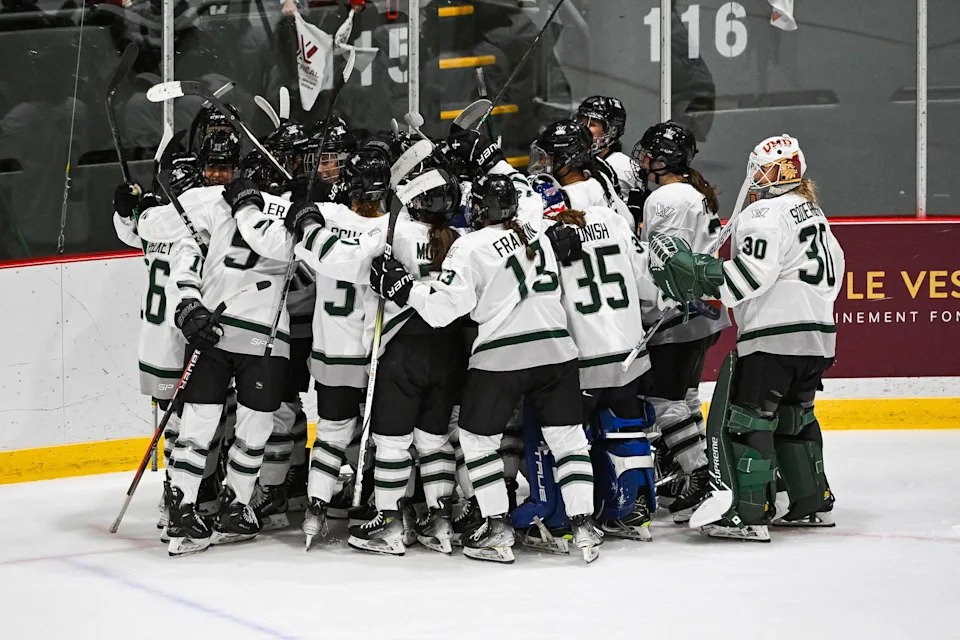 Jan 13, 2024; Montreal, Quebec, CANADA; Boston players gather to celebrate the win against Montreal during overtime in a PWHL ice hockey game at Verdun Auditorium. Mandatory Credit: David Kirouac-Imagn Images