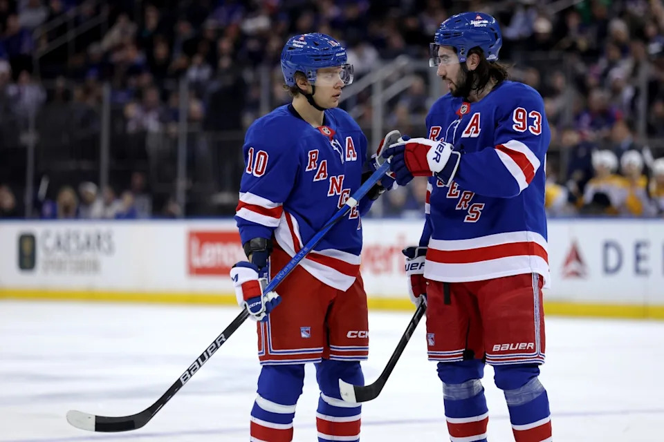 New York Rangers left wing Artemi Panarin (10) and New York Rangers center Mika Zibanejad (93) talk to one another during the second period against the Nashville Predators at Madison Square Garden.Brad Penner-Imagn Images