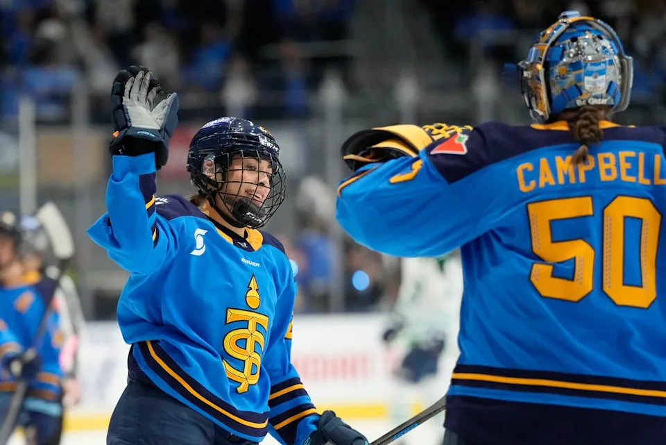 Toronto Sceptres' Sarah Nurse (20) celebrates her goal against the Boston Fleet with teammate goalie Kristen Campbell (50) during first period PWHL hockey action in Toronto on Saturday, Nov. 30, 2024. THE CANADIAN PRESS/Frank Gunn