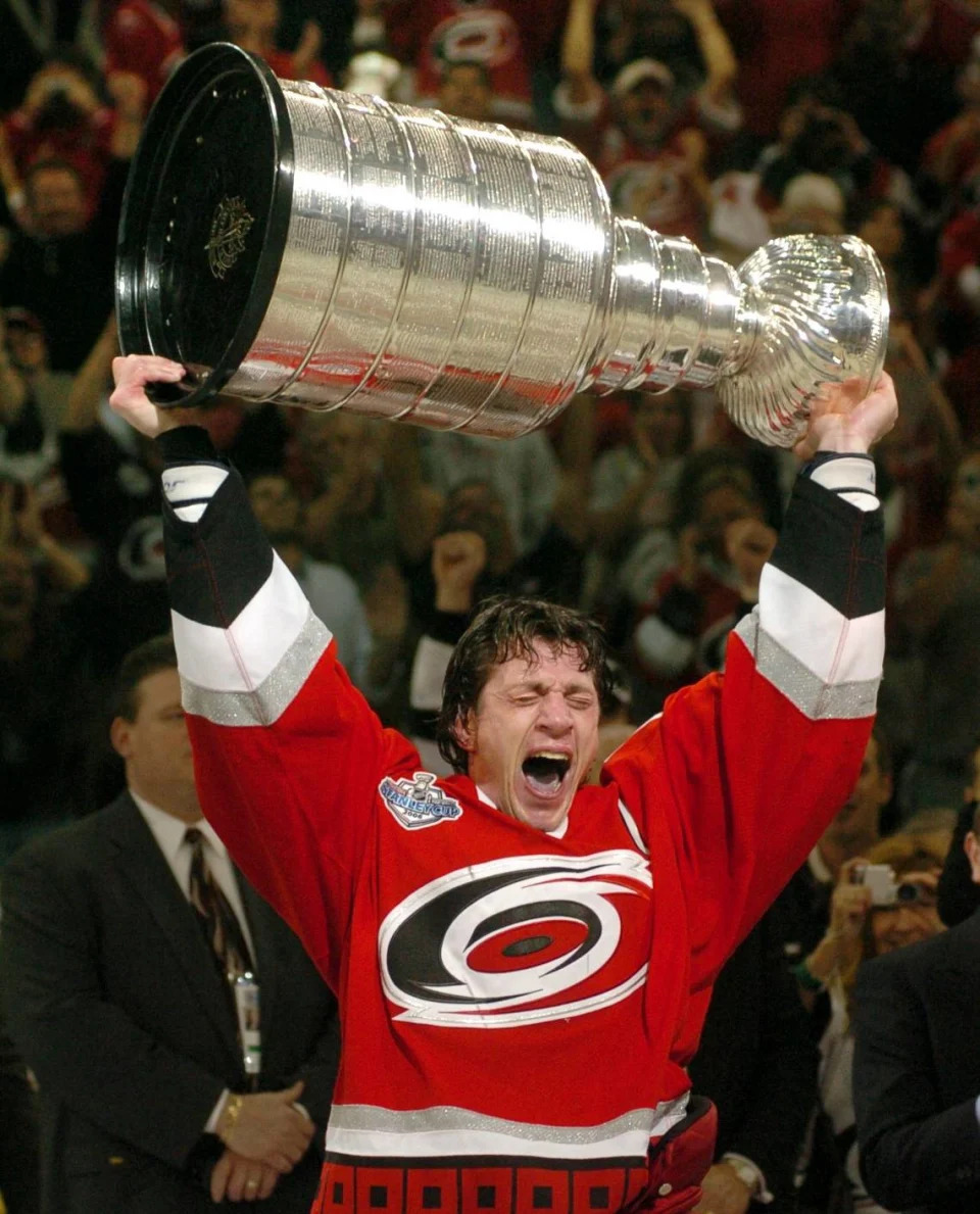 Hurricanes captain Rod Brind’Amour accept the Stanley Cup trophy after Carolina’s 3-1 win over Edmonton in game 7 of the Stanley Cup Final Wednesday, June 14, 2006 at the RBC Center.