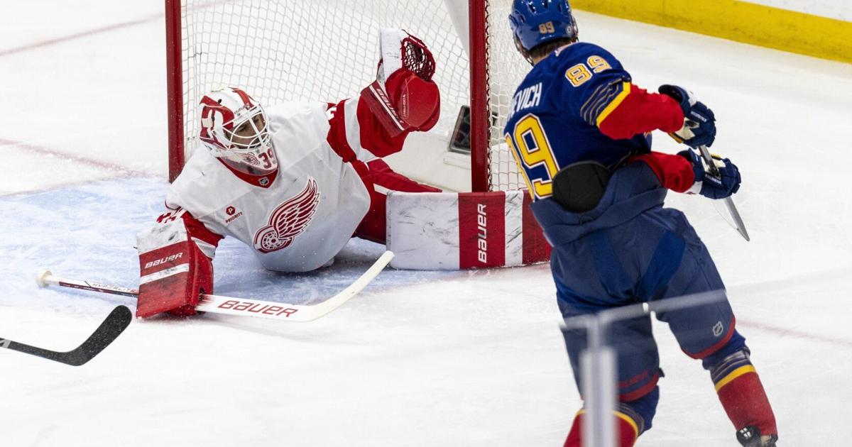 Blues come back for OT win vs. Detroit, extend streak to 10