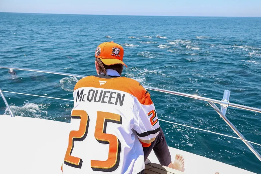 Ducks rookie Roger McQueen sights dolphins in Newport Harbor. (Anaheim Ducks)
