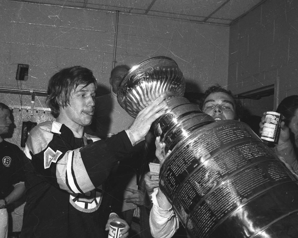 NEW YORK, NY - MAY 11:  Bobby Orr #4 of the Boston Bruins drinks from the Stanley Cup after Boston defeated the New York Rangers in Game 6 of the 1972 Stanley Cup Finals on May 11, 1972 at Madison Square Garden in New York, New York.  The Bruins defeated the Rangers 3-0 and won the series 4-2 in six games.  (Photo by Bruce Bennett Studios via Getty Images Studios/Getty Images)
