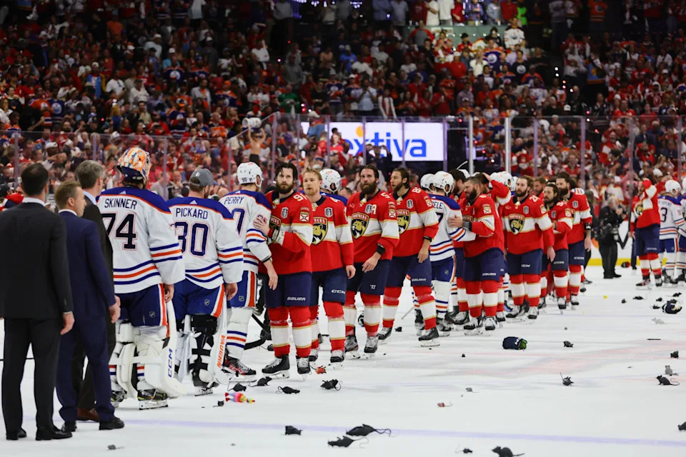 Florida Panthers and Edmonton Oilers players shake hands after Game 7 of the 2024 Stanley Cup Final. The Panthers held on for a 2-1 win after blowing a 3-0 lead in the series.© Sam Navarro-Imagn Images