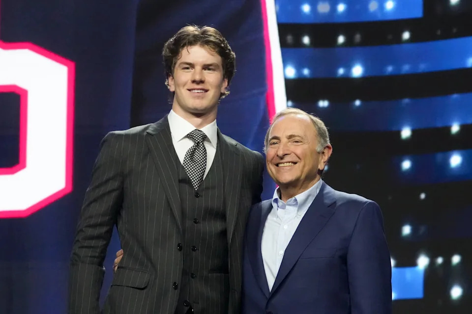 Jun 27, 2025; Los Angeles, California, USA; Jackson Smith is selected as the 14th overall pick to the Columbus Blue Jackets in the first round of the 2025 NHL Draft at Peacock Theater. Mandatory Credit: Kirby Lee-Imagn Images