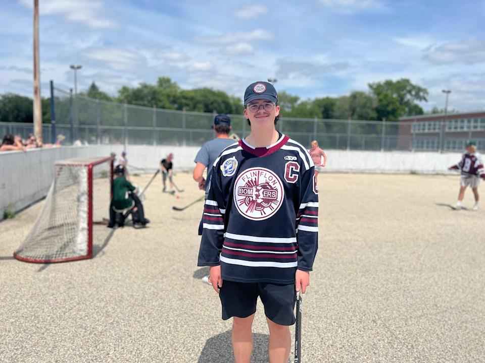 Former Flin Flon Bombers captain Lucas Fry, who played with the hockey team between 2020 and 2023, organized a free street hockey event for evacuated Flin Flon families at a community centre in Winnipeg on Sunday, June 15, 2025.