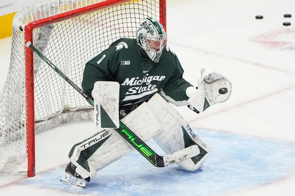 Michigan State goaltender Trey Augustine (1) warms up before Duel in the D between Michigan and Michigan State at Little Caesars Arena in Detroit on Saturday, Feb. 8, 2025.