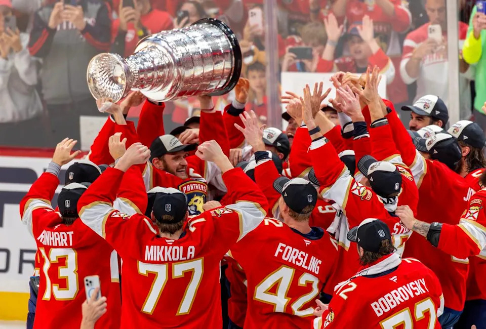 Florida Panthers center Aleksander Barkov (16) lifts the Stanley Cup with teammates after a 5-1 victory over the Edmonton Oilers in Game 6 of the Stanley Cup Final at Amerant Bank Arena on Tuesday, June 17, 2025, in Sunrise, Fla., clinching the NHL title.