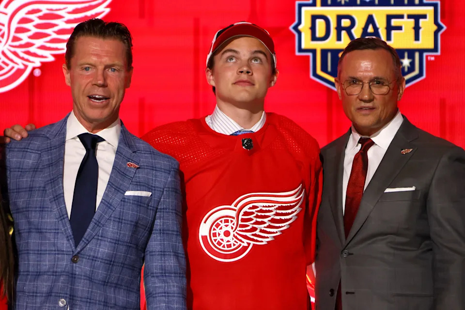 NASHVILLE, TENNESSEE - JUNE 28: Standing with Kris Draper and Steve Yzerman, Axel Sandin Pellikka is selected by the Detroit Red Wings with the 17th overall pick during round one of the 2023 Upper Deck NHL Draft at Bridgestone Arena on June 28, 2023 in Nashville, Tennessee. (Photo by Bruce Bennett/Getty Images) ORG XMIT: 775989686 ORIG FILE ID: 1503569446