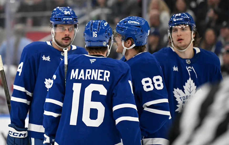 Toronto Maple Leafs forward Auston Matthews (34) speaks with Mitch Marner (16), William Nylander (88), and Matthew Knies (23).Dan Hamilton-Imagn Images