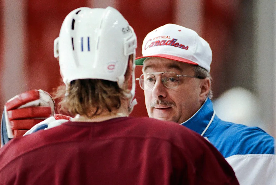 Montreal Canadiens head coach Jacques Demers talks at practice before a game against the Los Angeles Kings in the 1993 Stanley Cup Final.