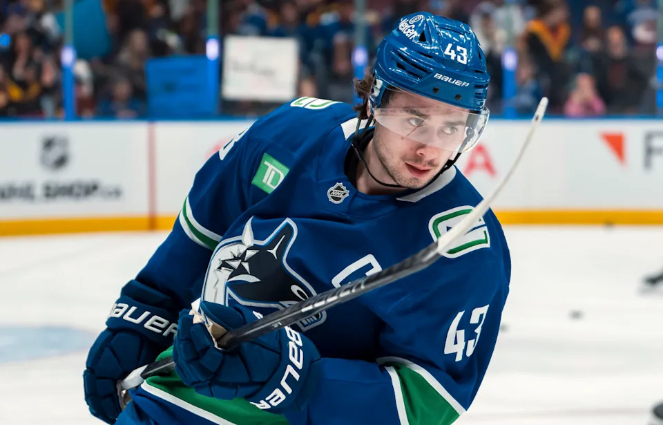 Vancouver Canucks defenseman Quinn Hughes (43) skates during warm up prior to a game against the Winnipeg Jets at Rogers Arena. Bob Frid-Imagn Images