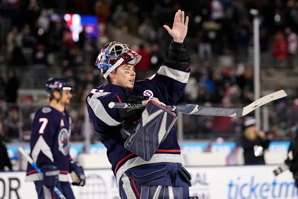 Columbus Blue Jackets goaltender Elvis Merzlikins (90) waves to fans following the 5-3 win over the Detroit Red Wings in the NHL Stadium Series game at Ohio Stadium on March 1, 2025.