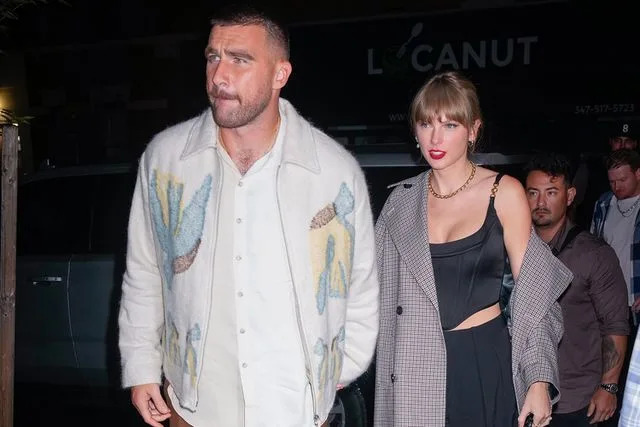 <p>Gotham/GC Images</p> Travis Kelce and Taylor Swift arrive at SNL Afterparty on October 15, 2023 in New York City.