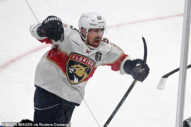 Marchand scored eight minutes into the second overtime period to earn victory for Florida