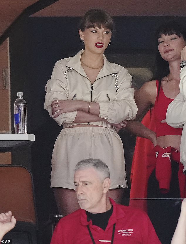 Swift wore her sandy blonde hair in a braided ponytail and rocked her signature red lip for the big game with Kelce