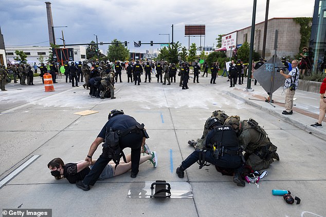 DENVER: A protestor is seen being arrested. A total of 17 people were arrested amidst the protests