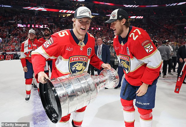 Anton Lundell holds the Stanley Cup after the Florida Panthers sealed back-to-back titles