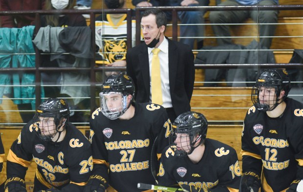 Colorado head coach Kris Mayotte instructs his players against the Union during an NCAA hockey game on Saturday, Oct. 16, 2021, in Schenectady, N.Y. (AP Photo/Hans Pennink)