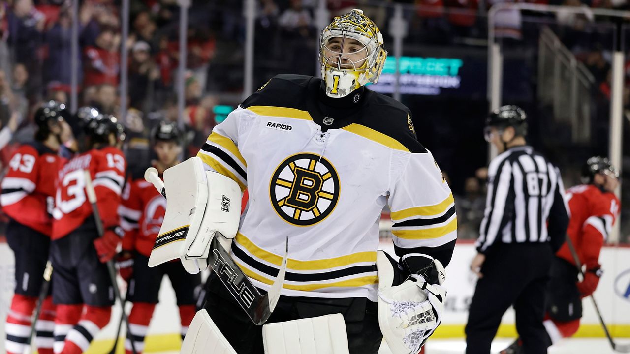 Boston Bruins goaltender Jeremy Swayman reacts after giving up a goal to New Jersey Devils right wing Stefan Noesen in the second period of an NHL hockey game Tuesday, April 8, 2025, in Newark, N.J. (AP Photo/Adam Hunger)