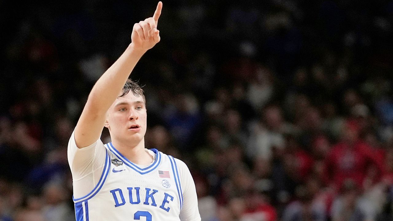 Duke forward Cooper Flagg celebrates after scoring against the Houston during the second half in the national semifinals at the Final Four of the NCAA college basketball tournament, Saturday, April 5, 2025, in San Antonio. (AP Photo/Brynn Anderson)