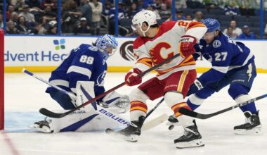 Tampa Bay goaltender Andrei Vasilevskiy and defenseman Ryan McDonagh team up to stop a shot in the first period against Calgary on Thursday night.