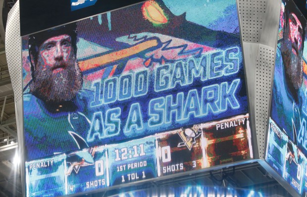 SAN JOSE, CA - JANUARY 15: The scoreboard informs hockey fans of San Jose Sharks' Joe Thornton's (19) 1,000th game as a Shark during a break in the action against the Pittsburgh Penguins in the first period at the SAP Center in San Jose, Calif., on Tuesday, Jan. 15, 2019. (Nhat V. Meyer/Bay Area News Group)