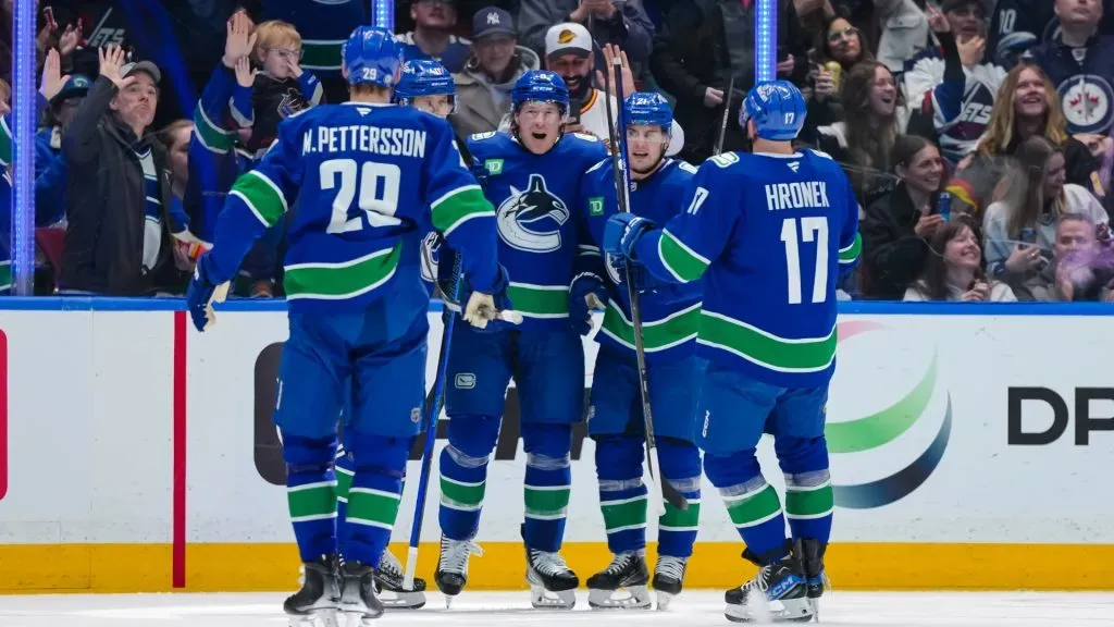 Brock Boeser #6 of the Vancouver Canucks is congratulated after scoring a goal against the Winnipeg Jets during the second period of their NHL game at Rogers Arena on March 18, 2025 in Vancouver, British Columbia, Canada. (Photo by Derek Cain/Getty Images)