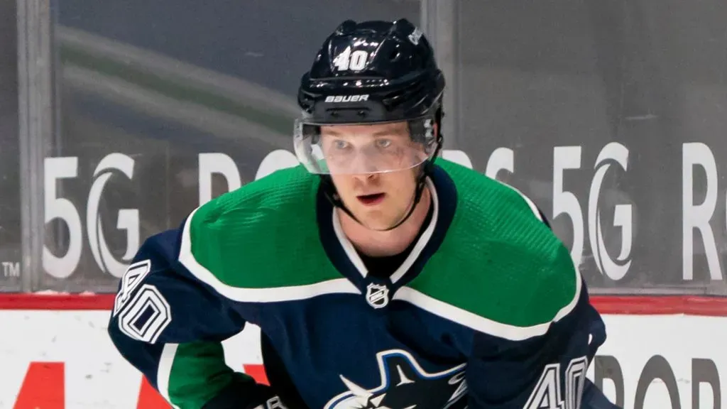 Elias Pettersson #40 of the Vancouver Canucks skates with the puck during NHL hockey action against the Winnipeg Jets at Rogers Arena on February 19, 2021 in Vancouver, Canada.