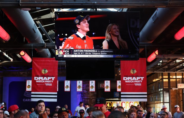 An image of a smiling Anton Frondell is cast on...