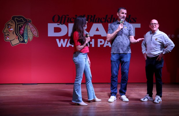 Chicago Blackhawks television broadcasters Rick Ball and Darren Pang offer...