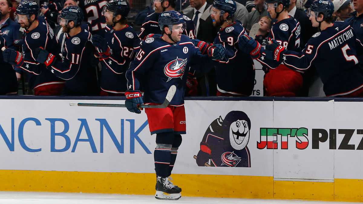 Columbus Blue Jackets defenseman Dante Fabbro (15) celebrates his goal against the Vancouver Canucks during the second period at Nationwide Arena.
